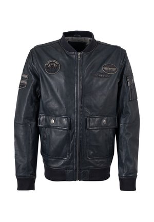 Schwarze Leder-Bomberjacke mit Reißverschluss, gerippten Bündchen und zwei Fronttaschen. Verziert mit mehreren gestickten Patches auf Brust und Ärmeln.