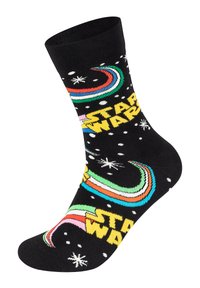 Zwarte sokken met kleurrijke "Star Wars"-tekst en regenboogspiraalpatronen, verfraaid met witte sneeuwvlokken op een textuurstof.