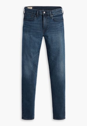 Ciemnoniebieskie dżinsy o slim fit, z pięcioma kieszeniami, zapięciem na guziki oraz delikatnym wyblaknięciem na nogawkach.