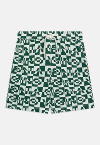 Costume da bagno verde e bianco con motivo a scacchi e testo in grassetto. Vita con coulisse regolabile e tasche laterali. Tessuto comodo.