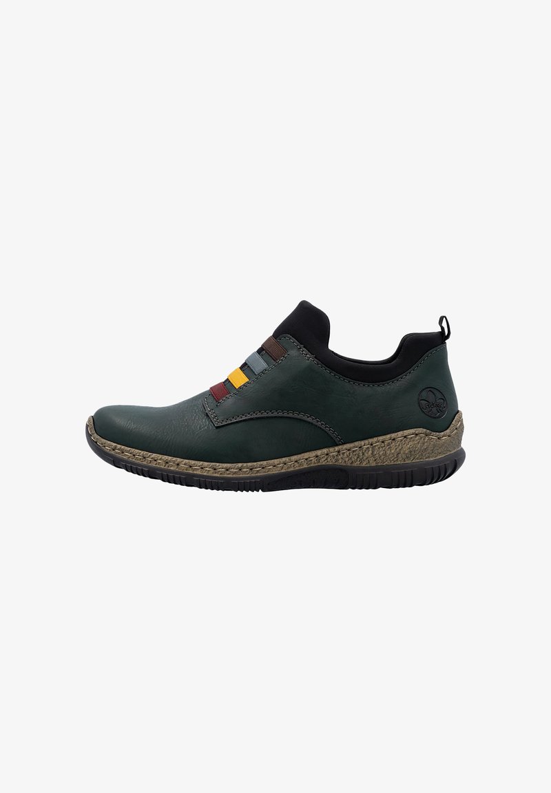 Bottine slip-on vert foncé avec des bandes élastiques multicolores, un col rembourré noir, une semelle intermédiaire texturée marron et une semelle extérieure en caoutchouc noir.