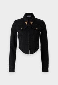 Black denim cropped jacket with long sleeves, buttoned front, two chest pockets, and gold triangular collar accents.