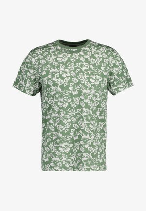 Camiseta verde de manga corta con un patrón floral blanco por todo el tejido y escote redondo.