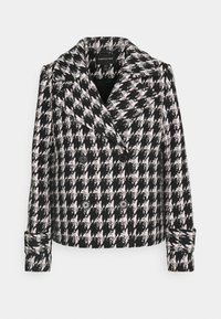 Černobílý kabát s houndstooth vzorem, dvouřadový, s širokým límcem a dvěma předními knoflíky, vyrobený z texturované látky s pevným střihnutím.