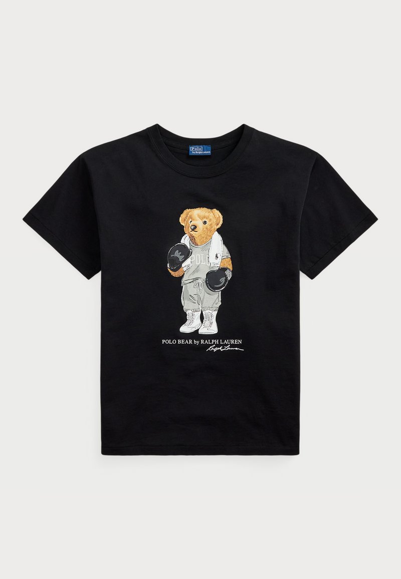 T-shirt en coton noir avec un graphique d'un ours polo en tenue de sport avec des gants de boxe. Le texte en dessous indique "POLO BEAR par RALPH LAUREN."