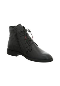 Schwarze Lederstiefelette mit seitlichem Reißverschluss und vorderer Schnürung, die rote Spitzen endet, flache Ferse und glattes, abgerundetes Zehendesign aufweist.