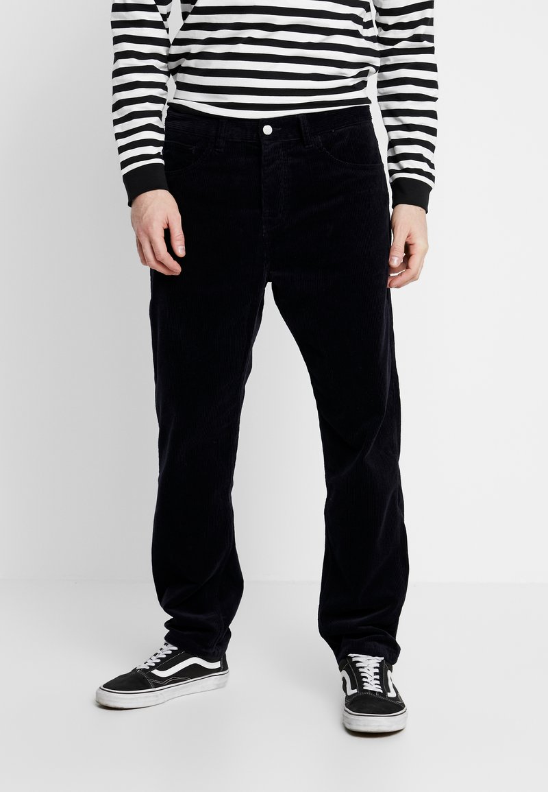 Carhartt WIP - NEWEL PANT COVENTRY  - Pantalones - dark navy rinsed, Ampliar