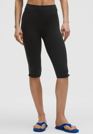 Groove High-Rise Notched-Hem Crop - Leggings - black