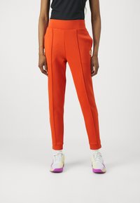 Nike Performance HERITAGE PANT - Treniņtērpa apakšdaļas - rust factor