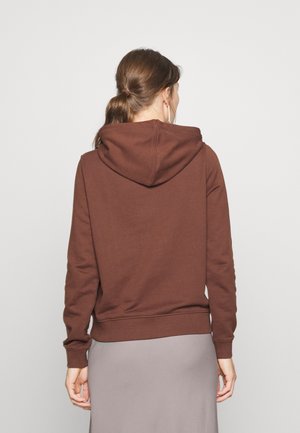 Felpa con cappuccio marrone dal taglio rilassato, con polsi e orlo a costine. Realizzata in tessuto morbido, presenta dettagli di cucitura e un design semplice.