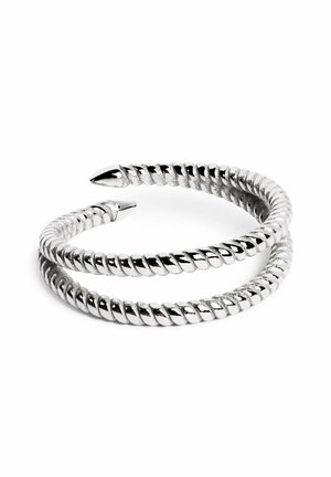 Silver-tone bracelet made of twisted metal, featuring pointed ends and a coiled design, showcasing a smooth and shiny texture.