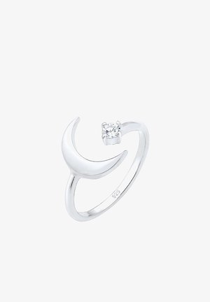 Anillo de plata con un diseño en forma de media luna y una pequeña gema redonda engastada en un engaste. La banda tiene un acabado pulido.
