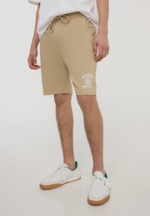 - Spodnie treningowe