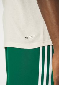 adidas Performance TR-ES FR T - Sport T-shirt - putty mauve/black