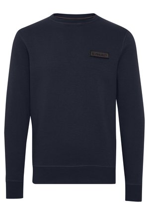 Mørkeblå sweatshirt med rund hals, lange ermer og et teksturert merke merket "11 PROJECT" på brystet. Mykt bomullsmateriale.