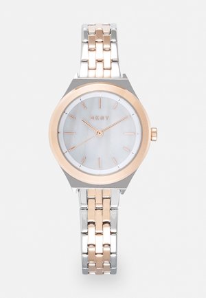 Silver and rose gold wristwatch with a round, mother-of-pearl dial. Features minimalist markers and a linked bracelet design. Brand: DKNY.