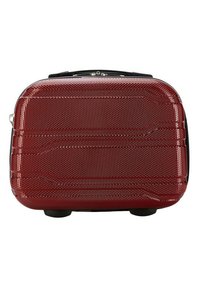 Valigia rigida rossa con superficie texturizzata, forma rettangolare elegante, maniglia superiore per il trasporto e dettagli neri alla base.