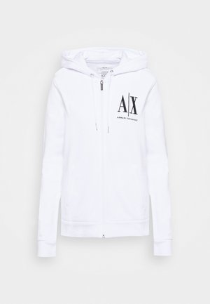Sweat à capuche blanc zippé avec capuche, arborant le logo noir "A|X Armani Exchange" sur la poitrine gauche et des poches avant.