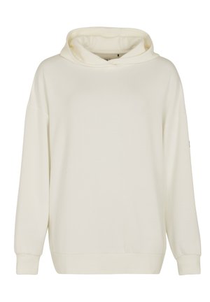 Felpa leggera beige chiaro realizzata in un tessuto morbido, dotata di un ampio cappuccio, spalle scese, maniche lunghe e orlo a costine. Design semplice e minimalista.