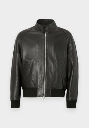 Black leather bomber jacket with a high collar, zip front, ribbed cuffs and hem, and side pockets. Smooth texture and sleek design.