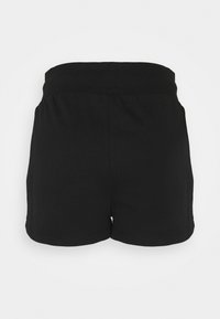 Black shorts made of soft fabric with an elastic waistband, featuring a simple design and a hem that sits above the thighs.