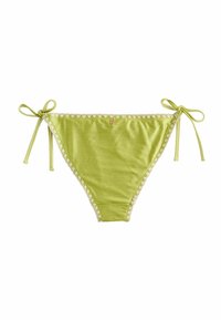 Zaļas bikini apakšdaļa ar sasienamām siksnām. Gluda auduma ar kontrastējošu viļņotu apdari. Mazs logotipa elements tuvu jostasvietai. Klasiska trīsstūra forma.