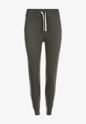 Pantalons de survêtement gris en tissu doux, avec une taille élastique équipée d'un cordon de serrage, des poches latérales et des jambes fuselées.
