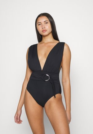 Black one-piece swimsuit with plunging neckline, wide shoulder straps, cinched waist, and decorative ring accent at the side. Smooth fabric texture.