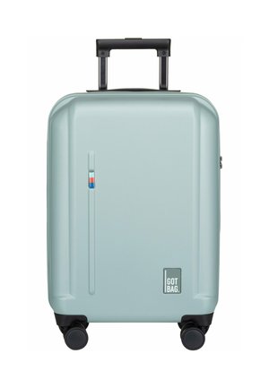 Maleta de mano rígida en un suave verde menta, con un mango retráctil, cuatro ruedas negras y un pequeño logo en el lateral.
