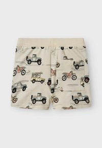 Shorts beiges en tissu doux, ornés d'un motif de divers véhicules tels que des camions et des motos, avec un détail de poche arrière.