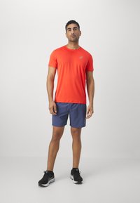 ASICS CORE TOP - Sports T-shirts - true red
