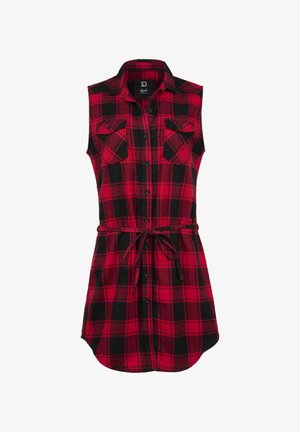 Vestido sin mangas de cuadros con patrones en rojo y negro, bolsillos frontales, cierre de botones y cintura con lazo. Confeccionado con una tela suave.