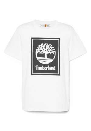 Valkoinen puuvillainen t-paita, jossa on suuri musta Timberland-logo, jossa on puusuunnittelu ja brändin nimi alla, suorakaiteen muotoisena.