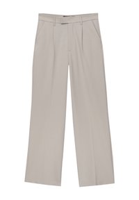 Pantalons larges beige clair avec une texture lisse, dotés de plis devant et de poches latérales, conçus pour un ajustement sur mesure.