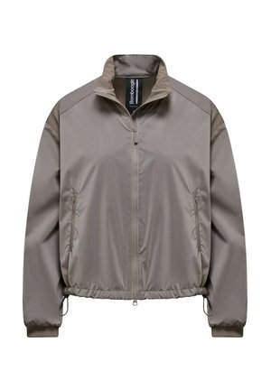 Lichtbruine windjack met ritssluiting, opstaande kraag, elastische manchetten en ritssluitingen op de zijzakken.