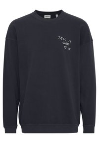 Navy sweatshirt made of cotton-blend fabric, featuring a crew neckline and long sleeves. Text "TELL IT LIKE IT IS" printed in white on the chest.
