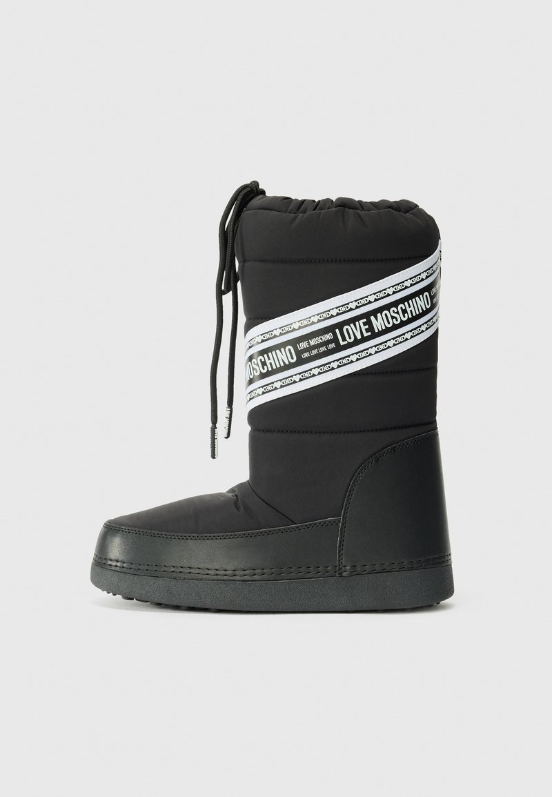 Black snow boot with textured fabric, padded upper, and a white band featuring repeated "LOVE MOSCHINO" text. Slip-resistant rubber sole.