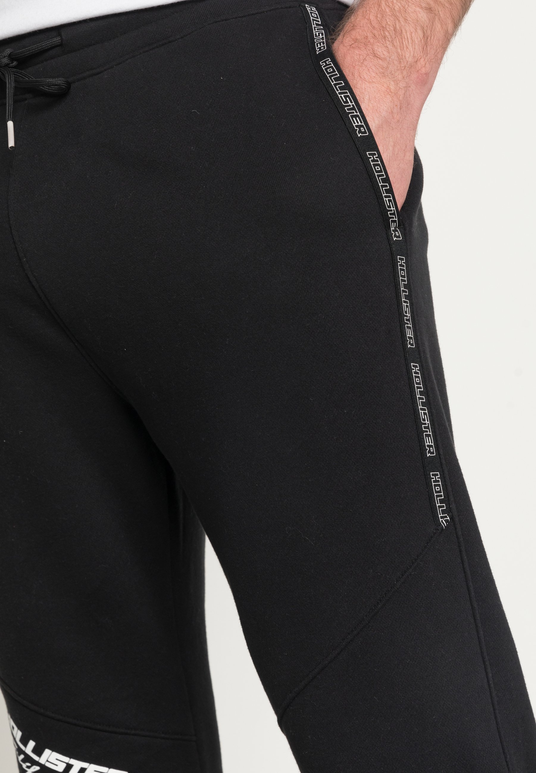 BABY TAPES - Tracksuit bottoms - black 