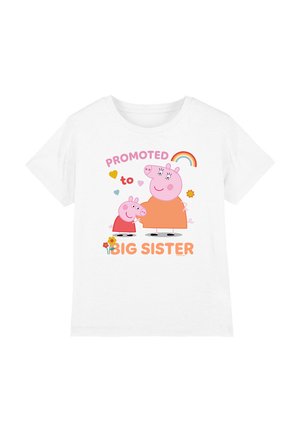 White cotton t-shirt featuring a graphic of two cartoon pigs. Text reads "PROMOTED to BIG SISTER" with colorful hearts and flowers.