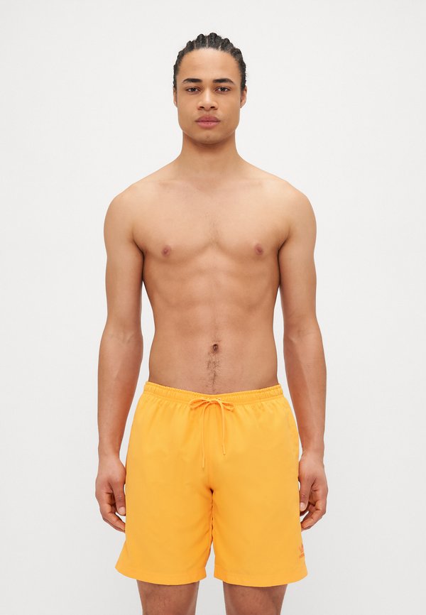 ADICOLOR 8-INCH - Swimming shorts - real gold