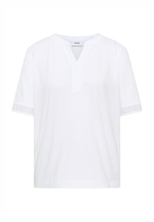 Hvid kortærmet bluse med V-udskæring og hulmønsterblonde på ærmekanterne, lavet af blødt stof, mærket "CECIL".