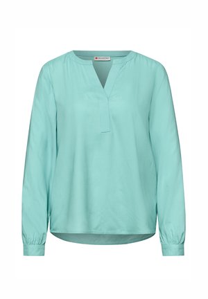 Lyseblå langærmet bluse med delt udskæring og manchetter med knapper, mærket Street One.
