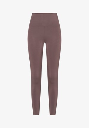 Legginsy z wysokim stanem w stonowanym odcieniu mauve, wykonane z gładkiego, elastycznego materiału. Posiadają bezszwowy design bez widocznych elementów metalowych.