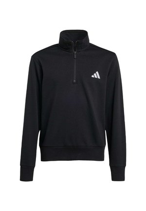 Jersey negro de manga larga con cuello de cremallera parcial y un pequeño logo blanco en el pecho izquierdo.