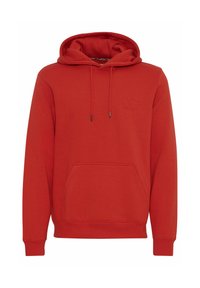 Red hooded sweatshirt made of thick fabric, featuring a front pocket, drawstring, and a subtle embossed logo on the chest.