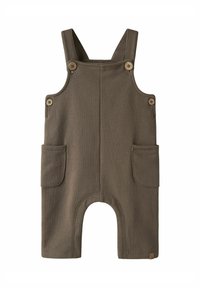 Salopette marron en tissu doux avec deux poches avant et des boutons sur des bretelles ajustables. Le modèle comprend une ouverture au niveau de la jambe pour plus de confort.