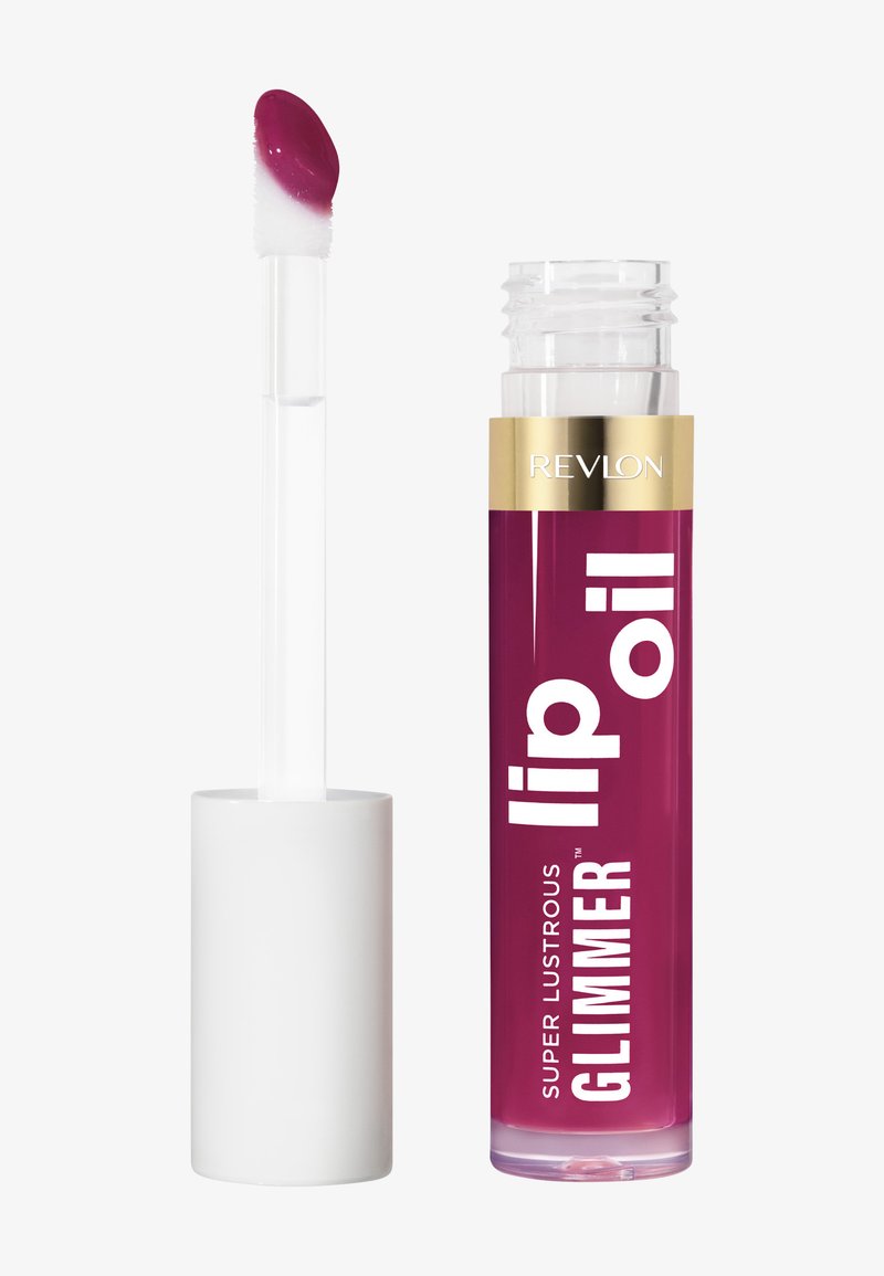 Olej do ust Revlon Super Lustrous Glimmer w przezroczystej tubie z złotą opaską, wyposażony w skośny aplikator z ciemno-magentowym olejem do ust.