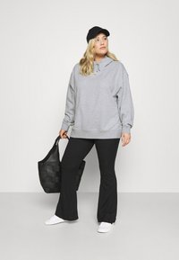 Nike Sportswear Sweatshirt com capuz - dark grey heather/white