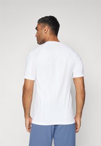 adidas Performance TENNIS PRO SEAMLESS AEROREADY FREELIFT - Camiseta deportiva - white