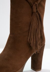 Unisa High heeled boots - cognac